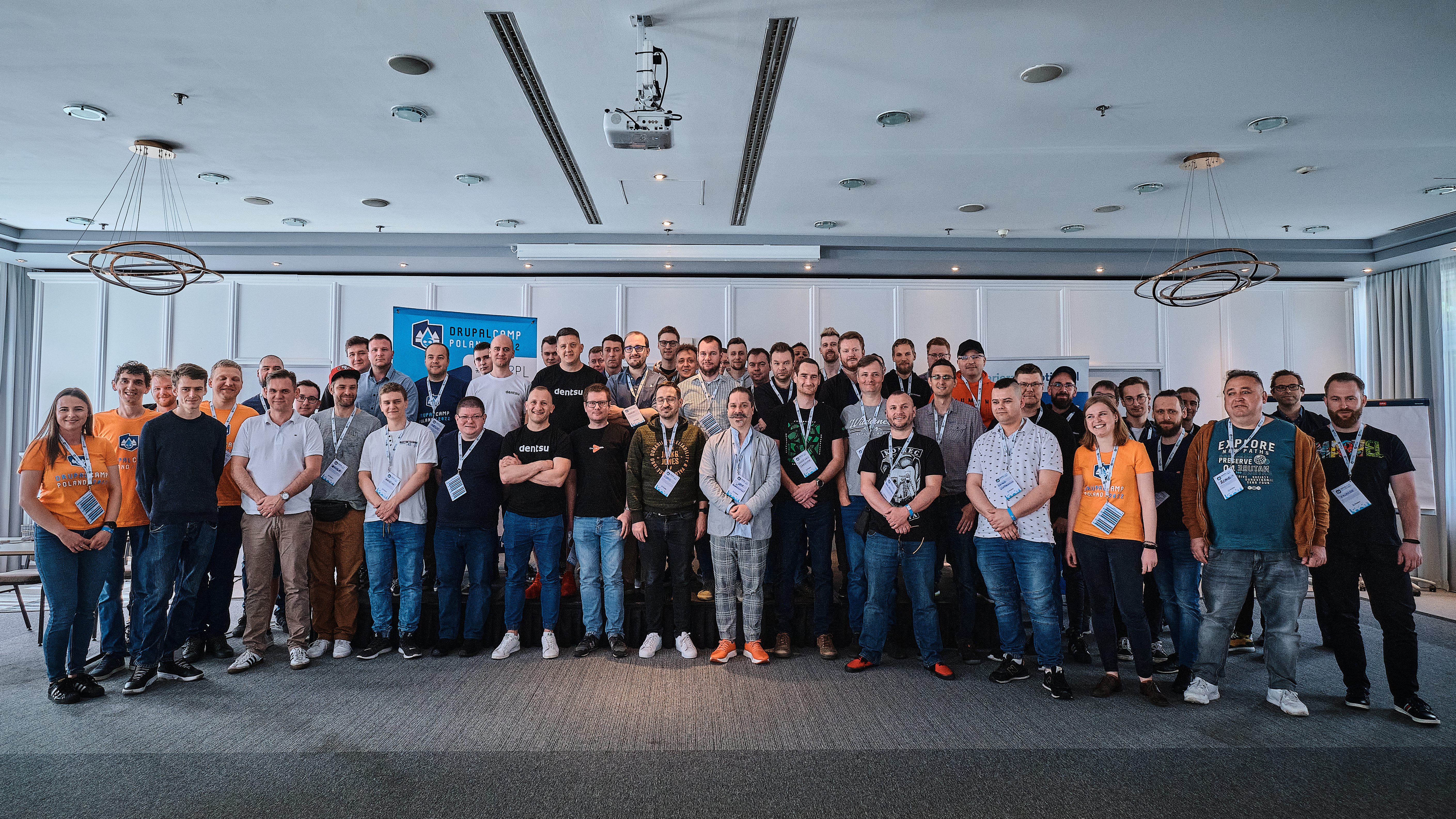 A group of participants and speakers of the DrupalCamp Poland conference, which took place in 2022