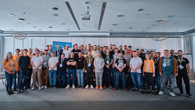 A group of participants and speakers of the DrupalCamp Poland conference, which took place in 2022