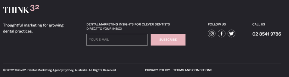 The footer of the Think32 agency website is distinguished by its simplicity and functionality