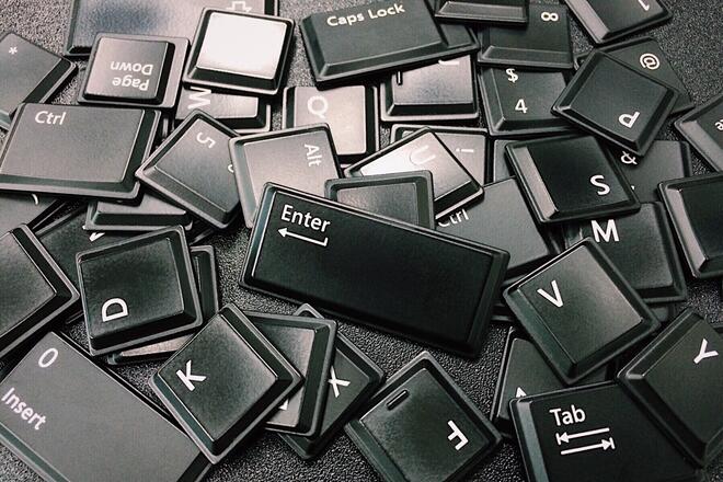 Computer keyboard keys spilled on the floor
