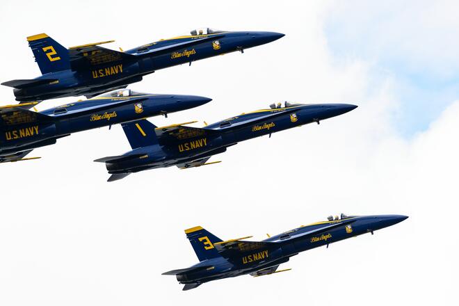 Four accelerating aeroplanes