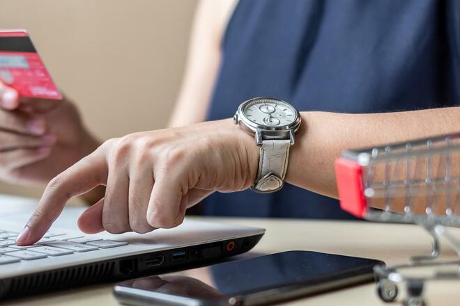 businesswoman-holding-card