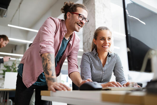 main blog post image - two developers working together