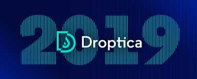 Droptica logo. In the background, there's "2019" text