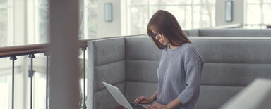 Drupal-based Project main blog article photo woman with a laptop