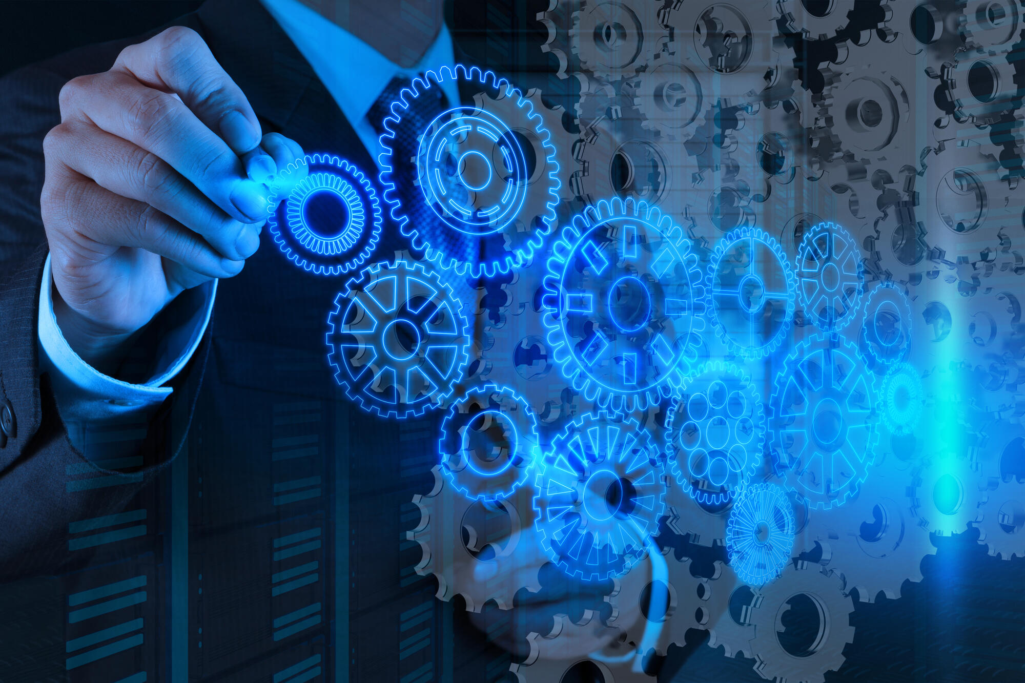 Business professional adjusting glowing gear icons over server racks, symbolizing Drupal GEO implementation and technical content work